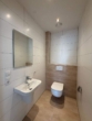 Gäste WC - Hochwertige Wohnung Nr. 1 im EG im Zentrum von Ostrhauderfehn zu vermieten! mit Carport