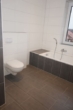 Bad - Hochwertige Wohnung 6 im II. Obergeschoss im Zentrum von Ostrhauderfehn zu vermieten