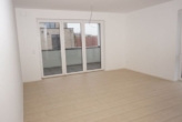 Wohnzimmer - Hochwertige Wohnung 6 im II. Obergeschoss im Zentrum von Ostrhauderfehn zu vermieten