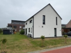 Bild - Neuwertiges KFW 40 Holzrahmen-Einfamilienhaus in Apen zu Verkaufen!
