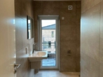 Bad - Stilvolle KfW 40 EE Neubau Penthouse-Wohnung Nr. 8 im Zentrum von Ostrhauderfehn! mit Carport und Dachterrassen