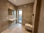 Bad - Stilvolle KfW 40 EE Neubau Penthouse-Wohnung Nr. 8 im Zentrum von Ostrhauderfehn! mit Carport und Dachterrassen