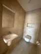 Gäste WC - Stilvolle KfW 40 EE Neubau OG-Wohnung Nr. 6 im Zentrum von Ostrhauderfehn! mit Stellplatz und Balkon